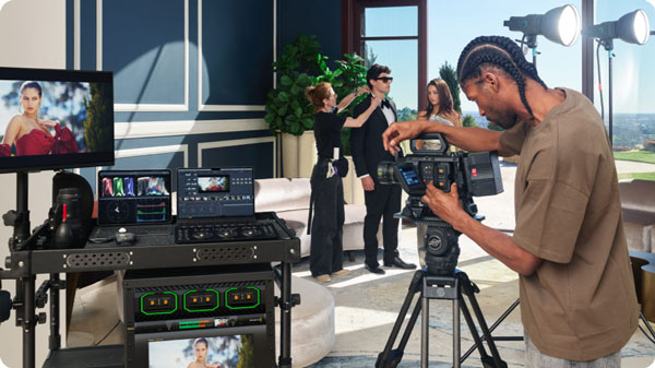 someone filming using a glackmagic ursa cine camera on a film or tv production set