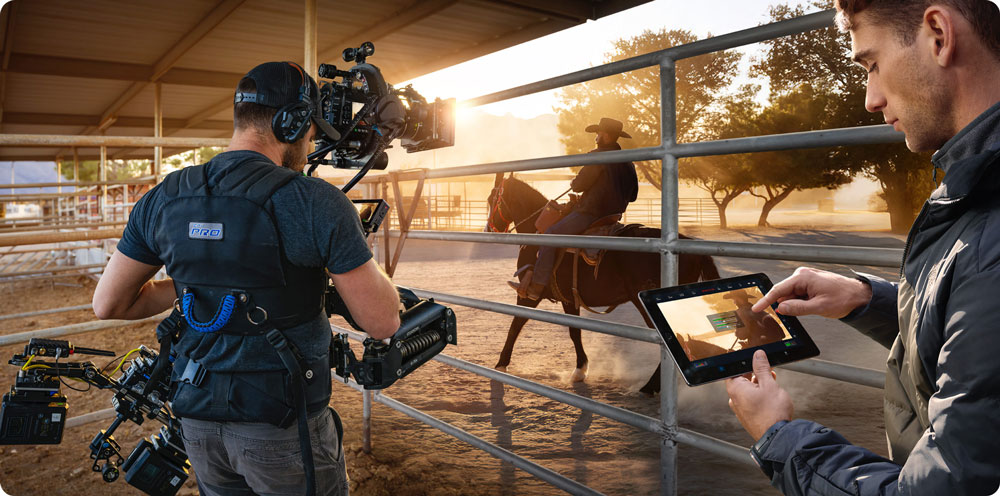 someone filming a cowboy on a horse using the blackmagic ursa cine
