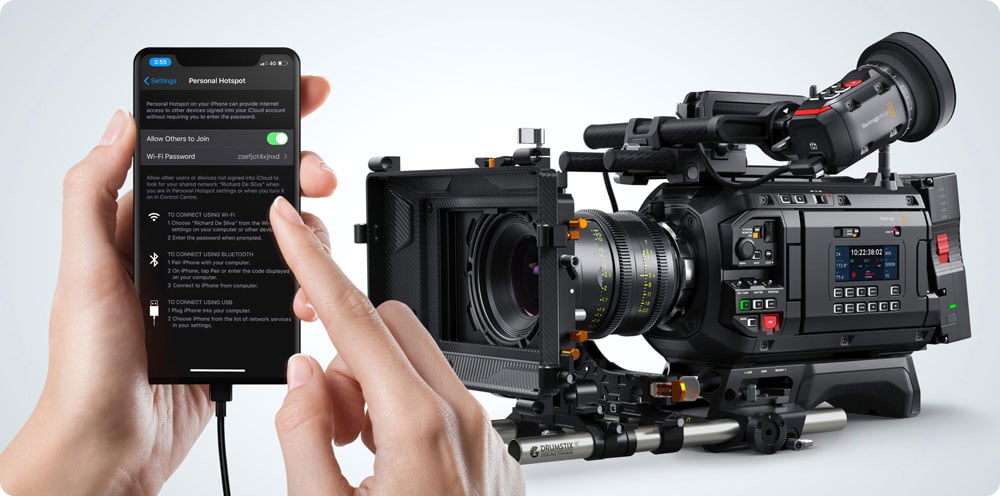 someone controlling the blackmagic ursa cine using a smartphone