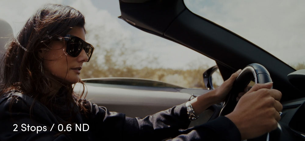 sample image of a woman in a car demonstrating the effect of the ND camera filter