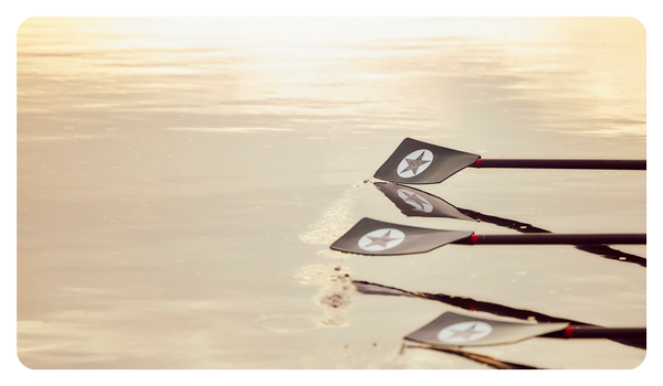 close up of oars in the water taken with the canon 70 200 lens