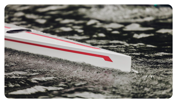 close up of a row boat in the water taken with the canon 70 200 lens