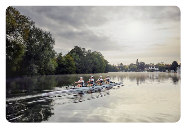image of people rowing on a river taken with the canon 70 200 lens