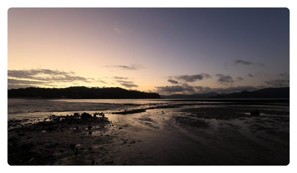 sample image of a beach at sunrise taken with the canon 35mm lens