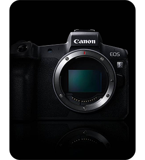 close up of the canon r camera on a black background