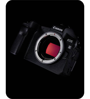 close up angled view of the canon r camera on a black background