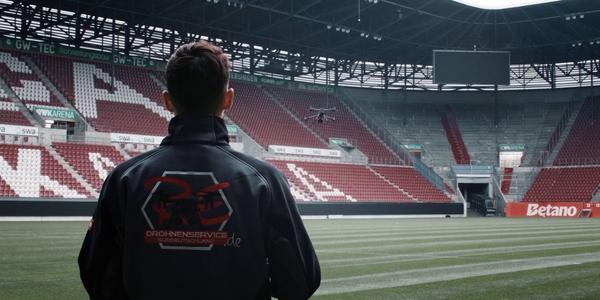 someone flying the dji matrice 400 inside of a stadium