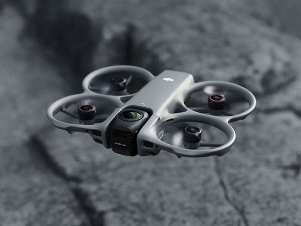 dji avata 360 flying over a stone cliff