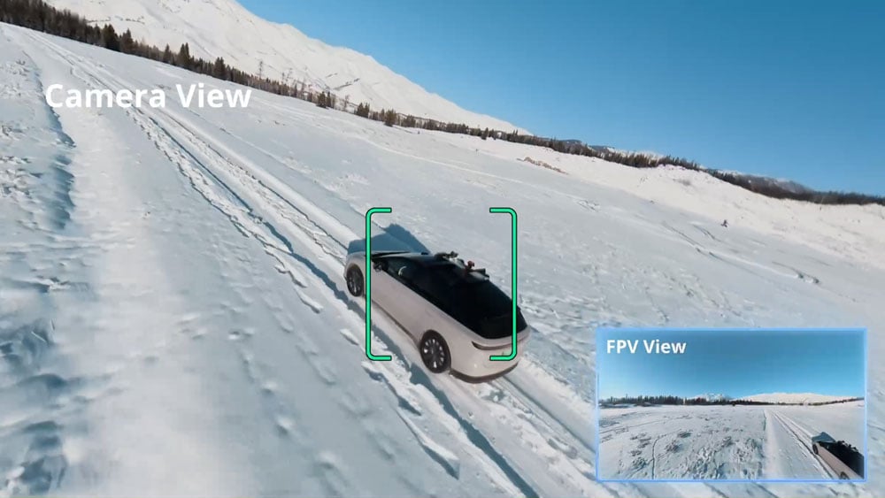 camera view and fpv view from the dji avata 360 filming a car in snow