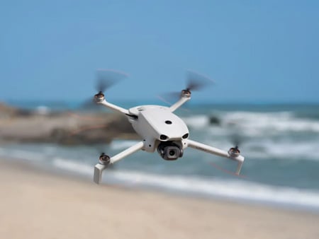 dji lito 1 flying over a beach