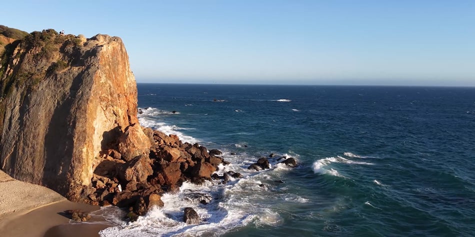 sample image from a video of a beach cliffside