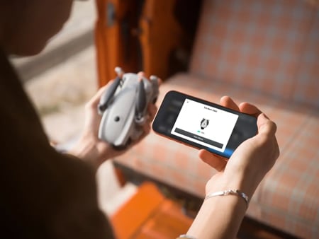 someone connecting the DJI app to the Lito x1 drone