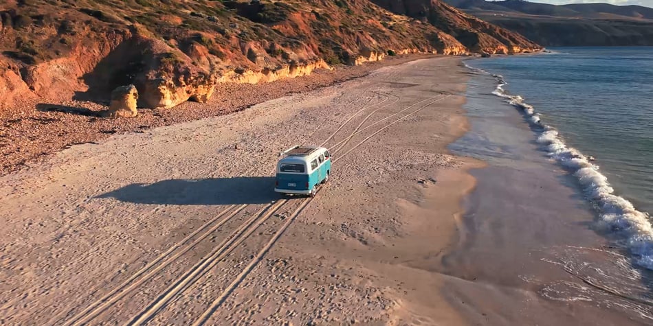 sample image from a camper van driving up a beach