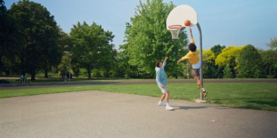 people playing basketball using the dji mic 3