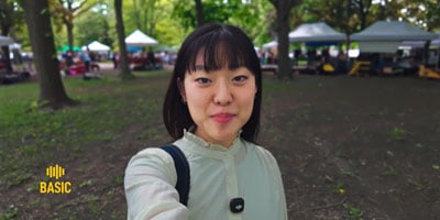 woman using basic noise cancelling on the dji mic 3
