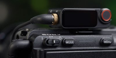 close up of the dji mic 3 mounted to a camera