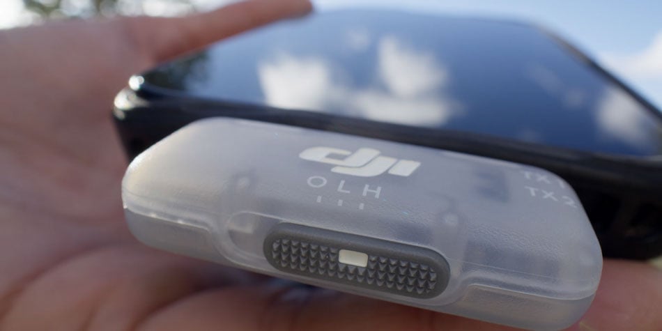 close up of the noise cancelling swithc in the dji mic mini reciever