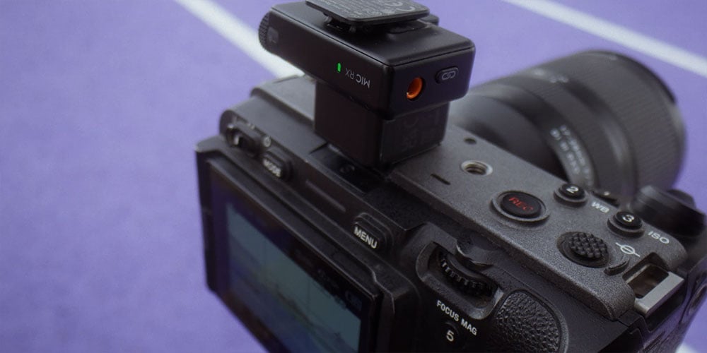 close up of the dji mic mini 2 reciever attached to a camera