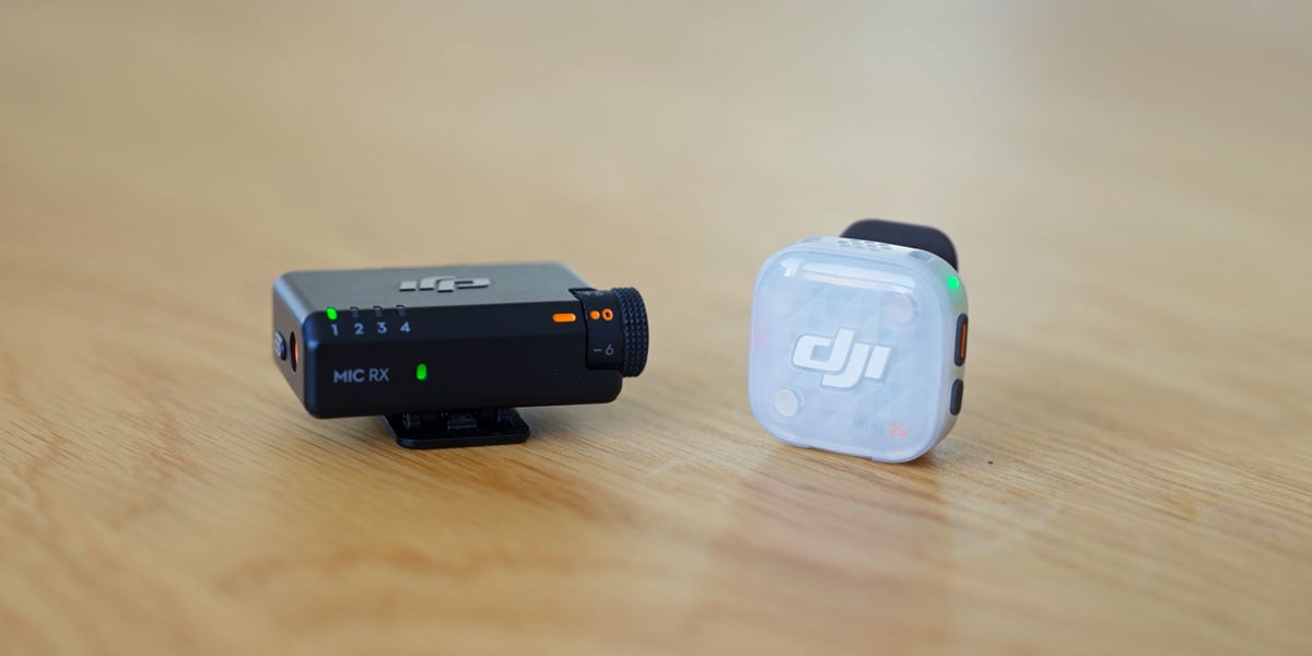 dji mic mini 2s receiverand transmitter on a wooden table