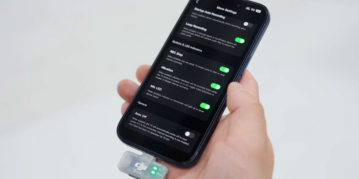 close up of the dji app settings with the mic mini 2s receiver connected to the bottom of a smart phone