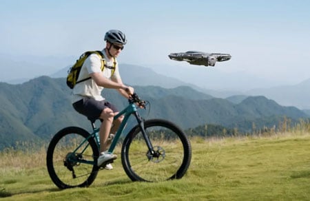dji neo 2 drone tracking a man on a bike
