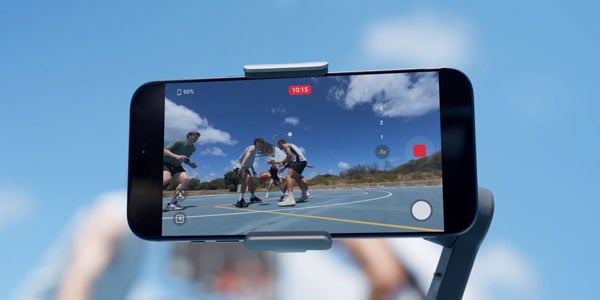 dji osmo mobile 8p being used while filming a basketball game