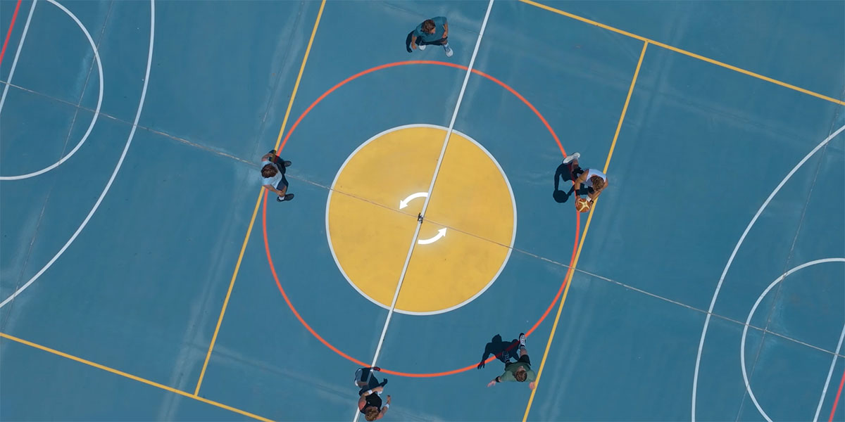 top down view of a basketball court mid spin from the dji osmo mobile 8p