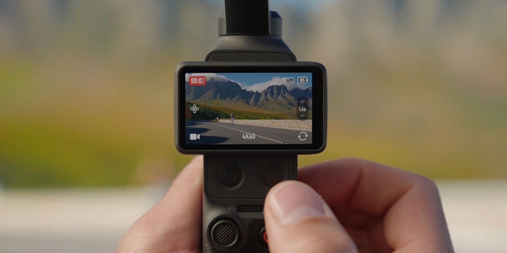 close up of someone zooming in on a skateboarder using the dji osmo pocket 4