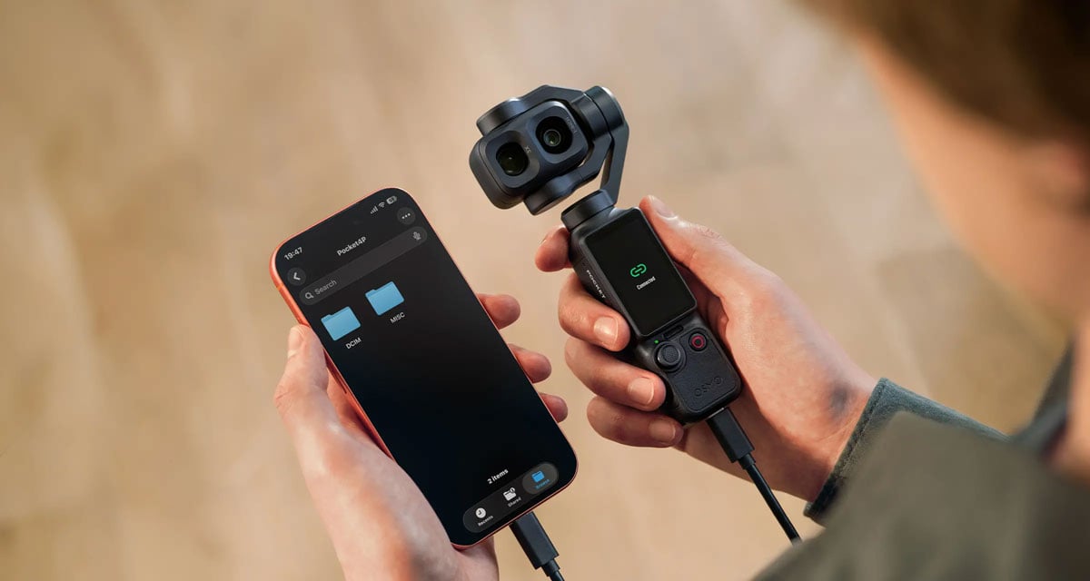 somone transferring files from the osmo pocket 4p to a smartphone via usb
