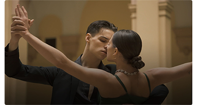 mid shot of two ballroom dancers dressed in black in a cream coloured ball room, DZOFILM Catta Zoom lenses