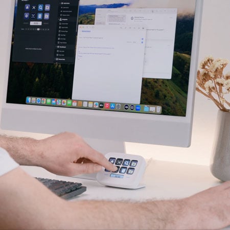 someone pressing the elgato stream deck neo