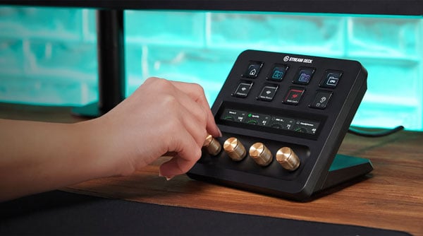 someone adjusting audio using a stream deck