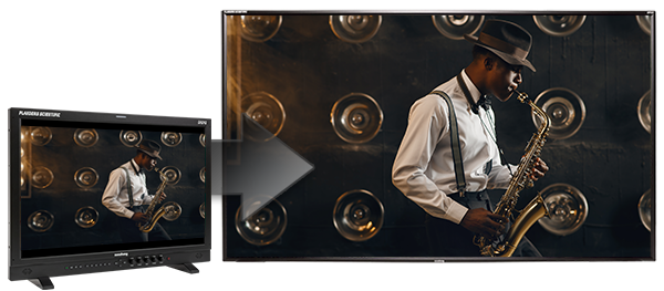Production monitor outputting a high-definition video signal to a large reference display screen during video editing