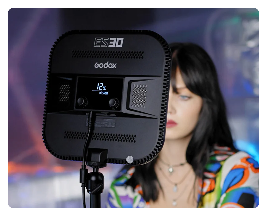 a woman looking into the godox es30 light