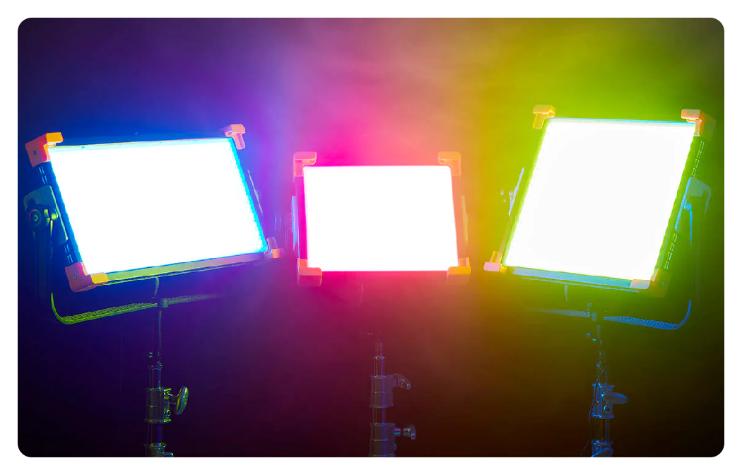 3 godox panel lights side by side lit up different colours