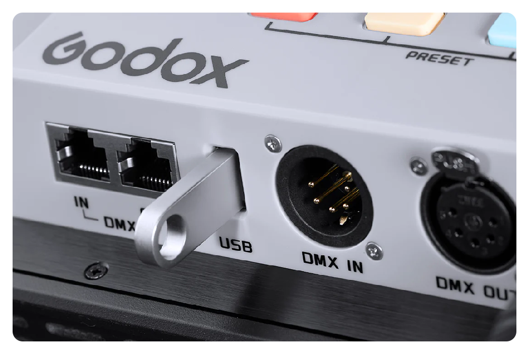 usb drive connected to the godox panel light for firmware updates