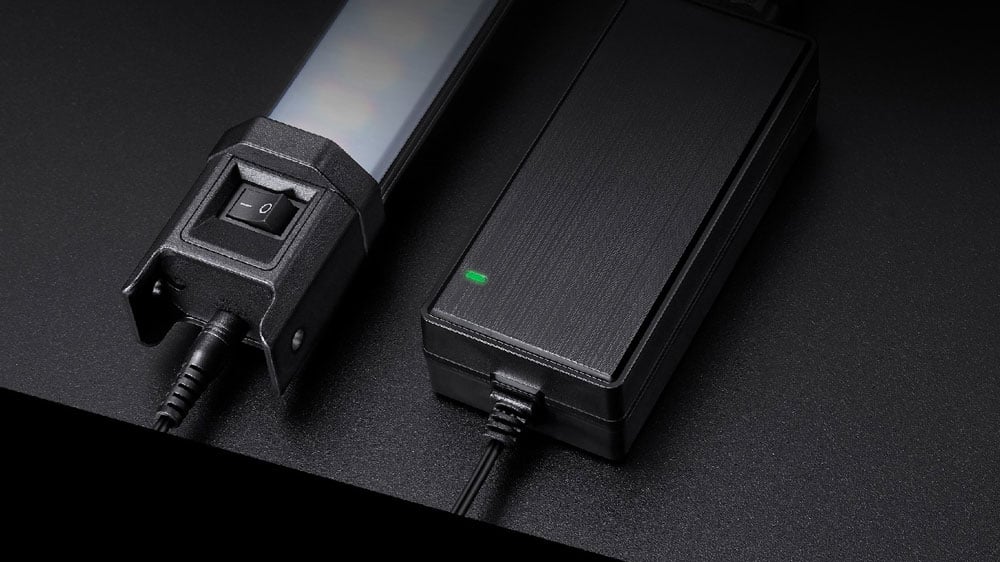 Godox TL60 Tube Light connected to a power adapter