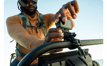 man attaching GoPro HERO13 Black to bar mount