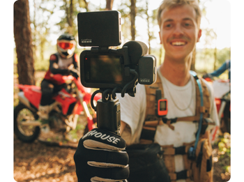 motocross rider holding GoPro HERO13 Black Creator Edition recording selfie video