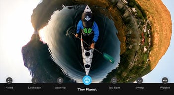 360 tiny planet footag of person in kayak on river