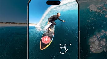 iPhone with GoPro Quik app showing footage of surfer on wave being reframed