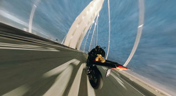 Sample photograph of motorbike riding on bridge at night