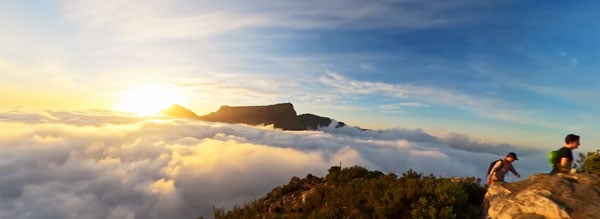 timelapse sample image of cloud draped mountains at sunrise