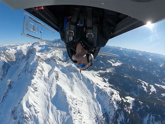 view from the dsahboard of a fighter jet cockpit while the plane is upside-down