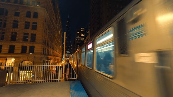 close up of a train driving past in downtown chicago