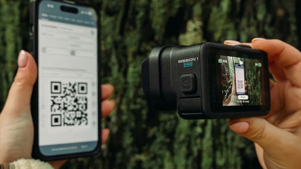 someone scanning a qr code using the gopro mission 1