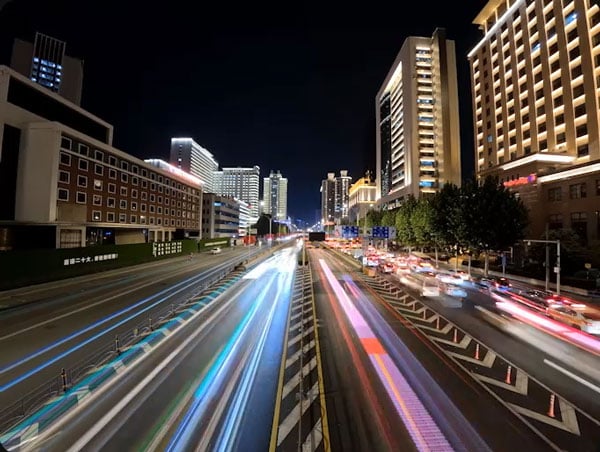 vehicle light trails on a highway