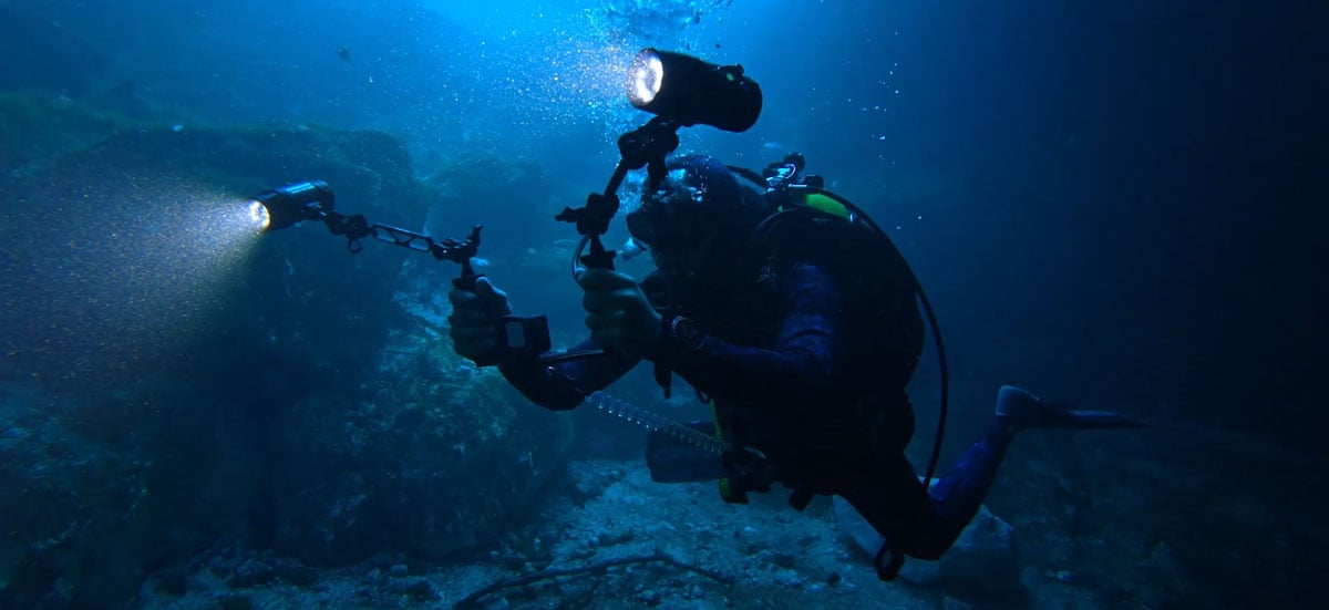 someone filming using the gopro mission 1 underwater