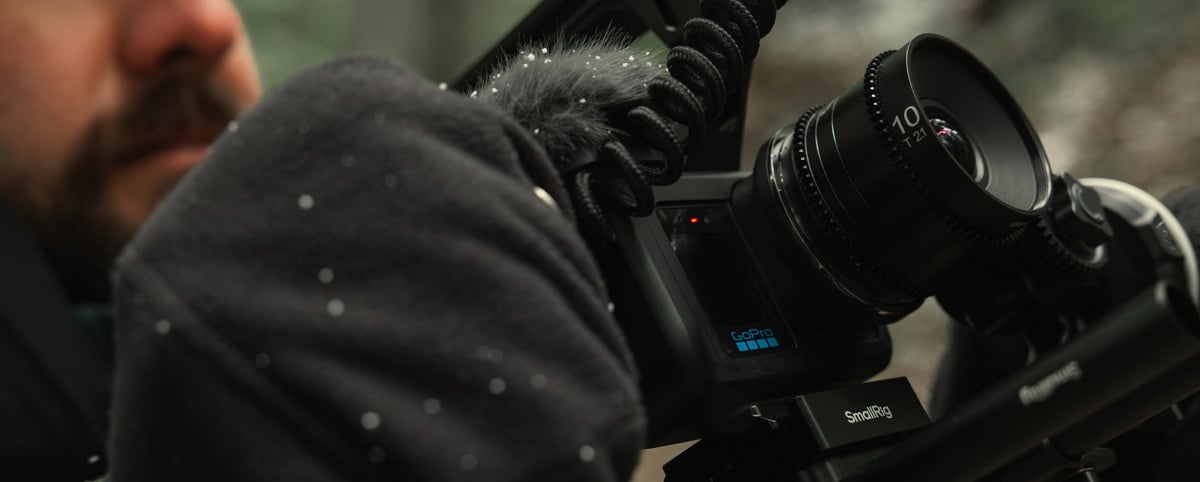 GoPro Mission 1 PRO ILS compact cinema camera mounted with a manual prime lens on a SmallRig bracket in a full cinema setup