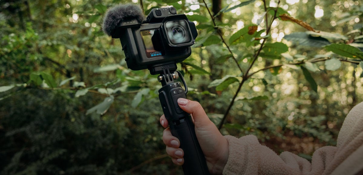 close up of someone holding a mission 1 camera on the gopro volta 2